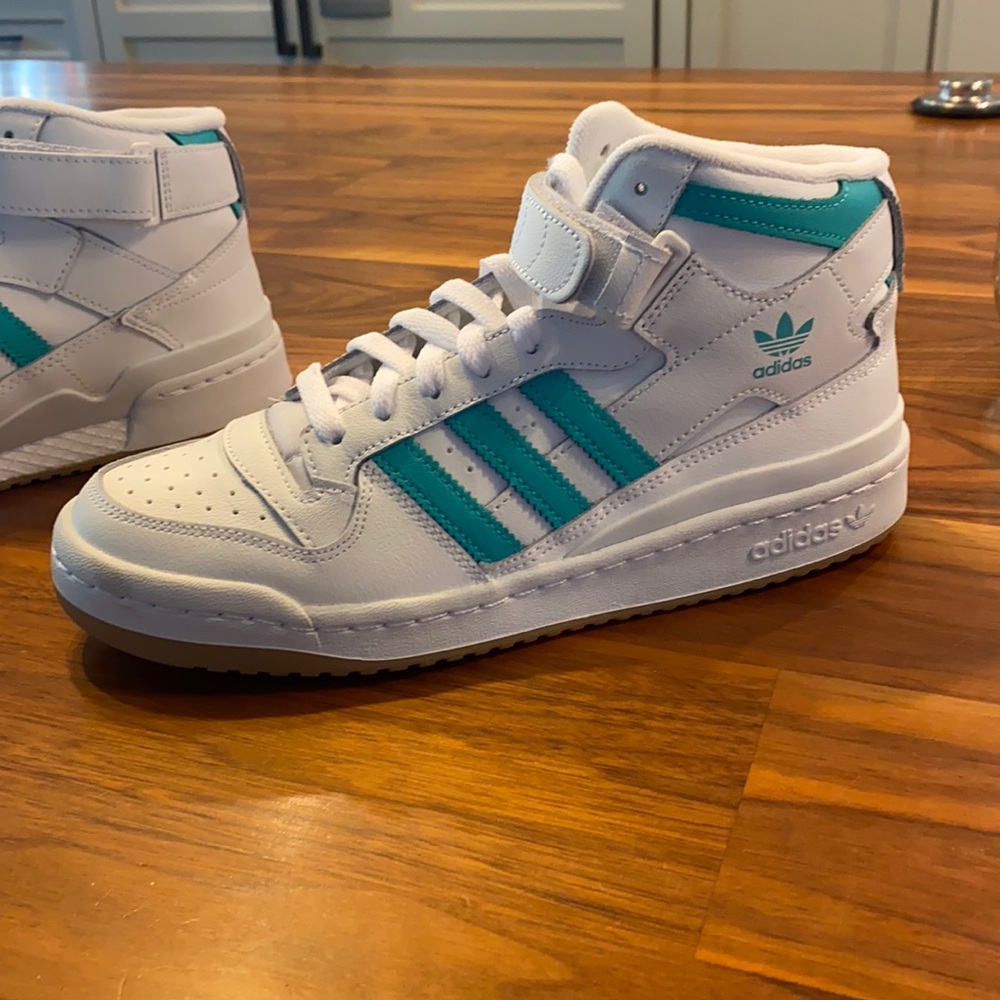 Teal low forum high tops